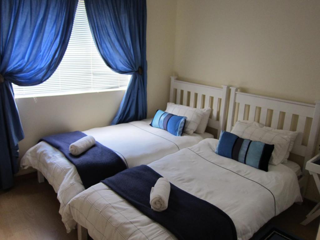Smithland Guest Apartments Cape Town Белвилл Номер фото